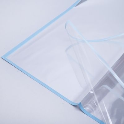 картинка Пленка лист прозрачный с цветной окантовкой, синий, 58смх58см; Россия от магазина Флоранж